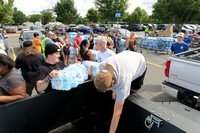 Bucket brigade unloading the water